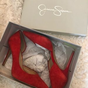 Red pointy toe pumps